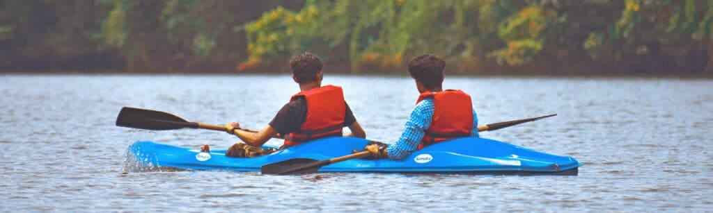 2 men in a kayak