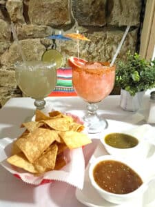 Chips, salsa, and two margaritas