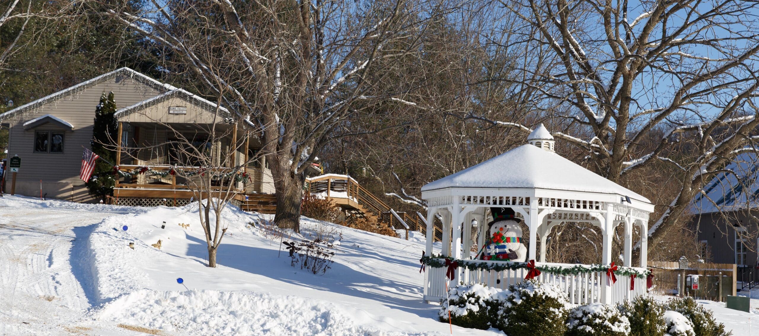 Gazebo and main house in winter