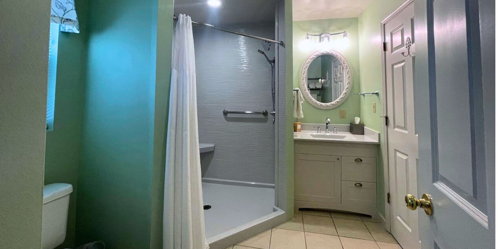 somerset bathroom featuring walk-in shower and vainty.