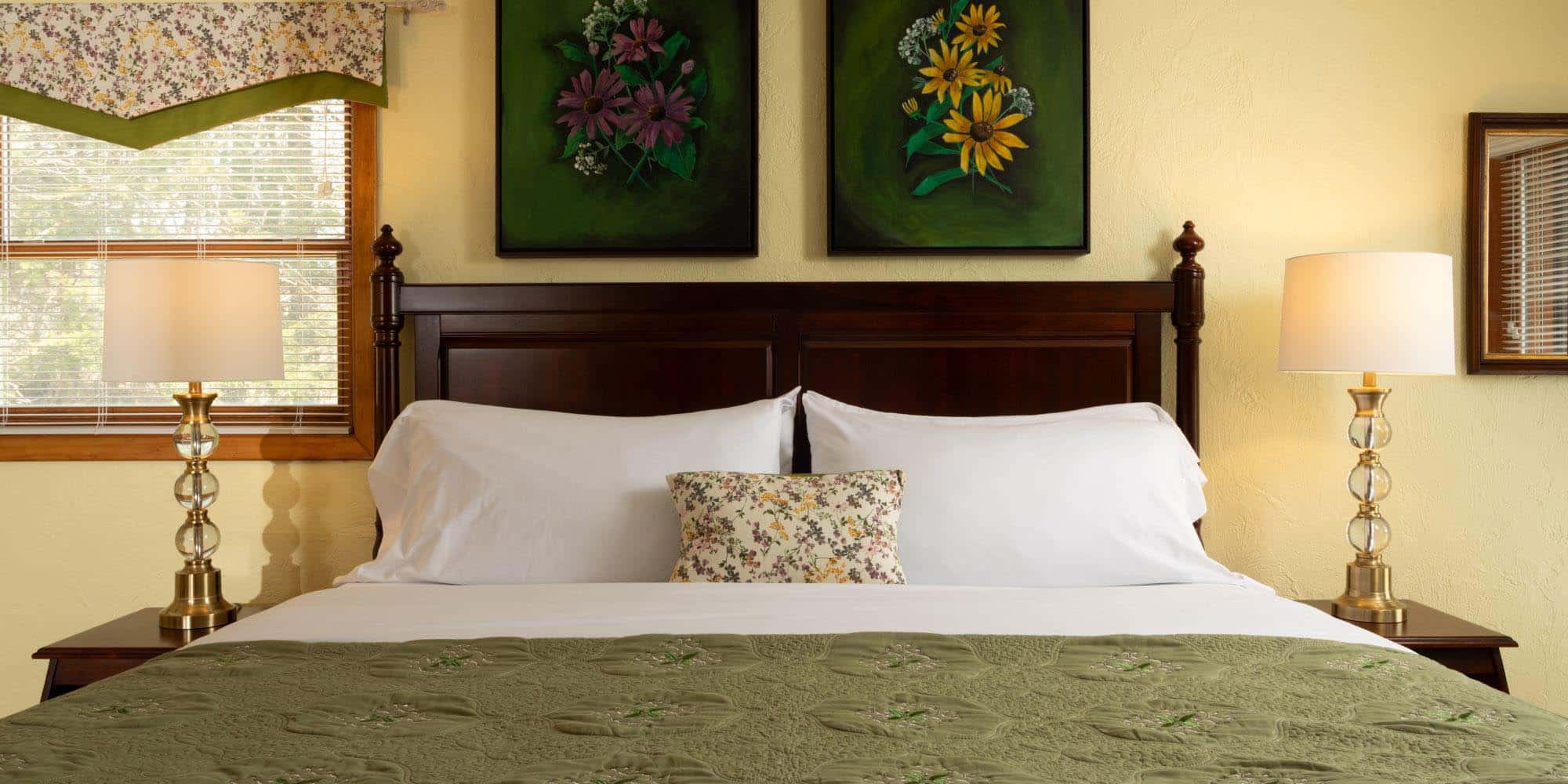 large king bed in yellow bedroom
