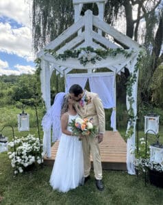 A couple kissing during their stress-free elopement at Hawk Valley Retreat & Cottages